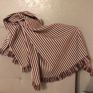 Burgundy and off-white throw blanket